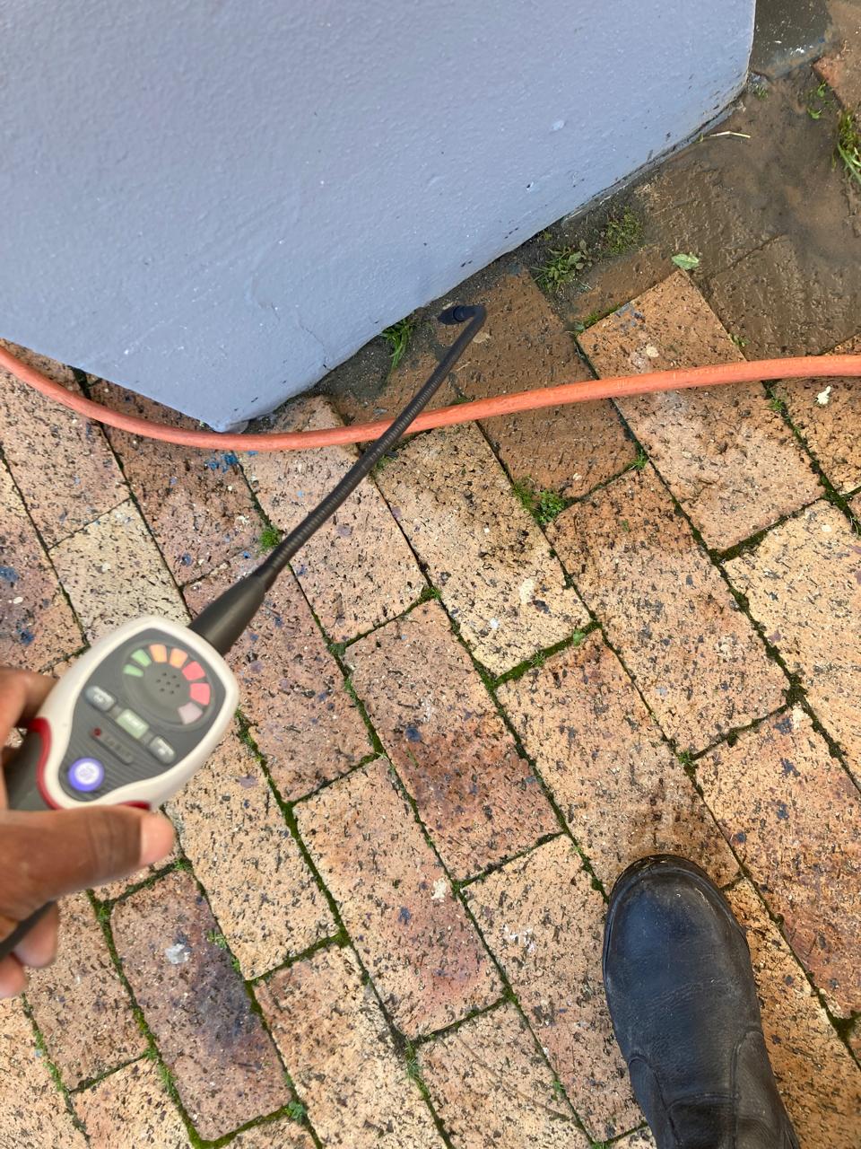 Leak detection — technician with detector